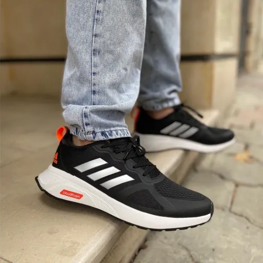 کفش ورزشی و رانینگ زنانه آدیداس مدل Adidas Cloudfoam - مشکی با جزئیات نارنجی و زیره سفید | مستر کوالیتی