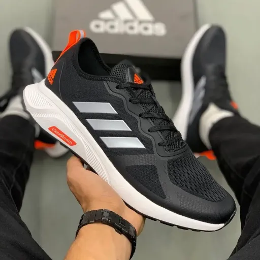 کفش ورزشی و رانینگ زنانه آدیداس مدل Adidas Cloudfoam - مشکی با جزئیات نارنجی و زیره سفید | مستر کوالیتی