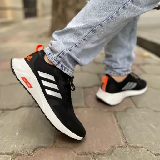 کفش ورزشی و رانینگ زنانه آدیداس مدل Adidas Cloudfoam - مشکی با جزئیات نارنجی و زیره سفید | مستر کوالیتی