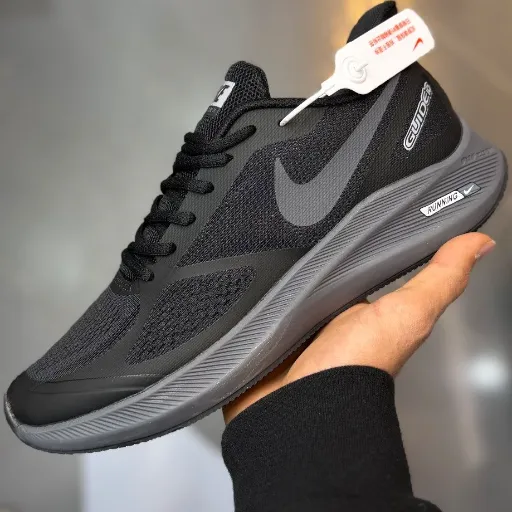 کتونی نایکی ایر زوم گاید سایز بزرگ (Nike Air Zoom Structure / Guide) - رویه پارچه‌ای مشکی با زیره لژدار طبی و سووش طوسی زغالی | مستر کوالیتی