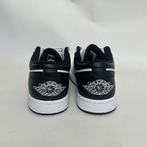 کتونی نایکی ایر جردن ۱ لو (Nike Air Jordan 1 Low) - رویه چرمی تمام سفید با سووش و پاشنه مشکی | مستر کوالیتی