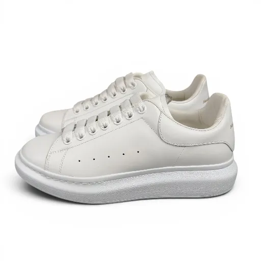 کفش ونس الکساندر مک‌کویین سفید (Alexander McQueen White Sneaker) - رویه چرم صنعتی مرغوب تمام سفید | کیفیت عالی
