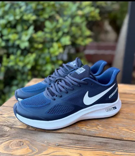کفش دویدن و اسپرت زنانه نایکی مدل Nike Guide 10 - رنگ سرمه‌ای زیره سفید | مستر کوالیتی