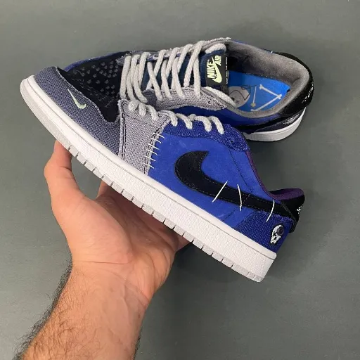 کفش اسپرت ایر جردن مدل Air Jordan 1 Low OG - رنگ آبی رویال طرح پچ‌ورک | مستر کوالیتی