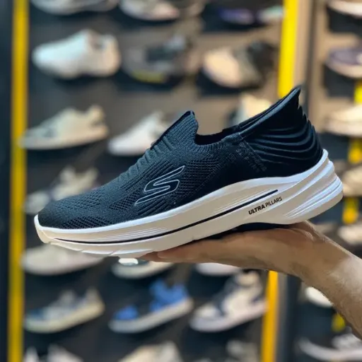 کفش پیاده‌روی و راحتی اسکیچرز مدل Skechers Go Walk / Slip-ins - رویه جورابی مشکی با زیره لژدار سفید | مستر کوالیتی