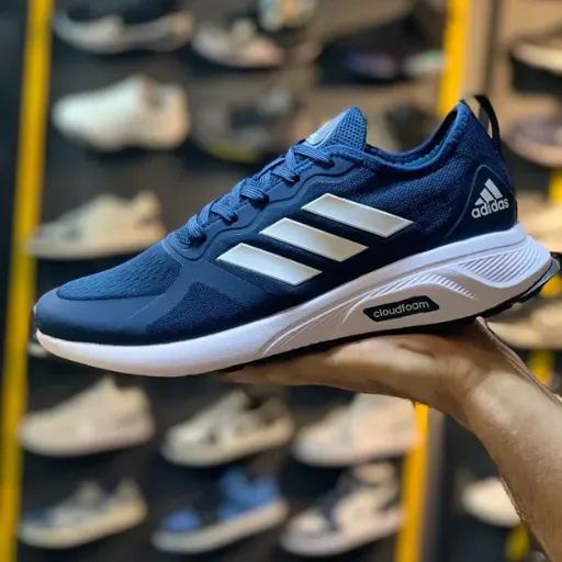 کتونی آدیداس کلادفوم سرمه‌ای (Adidas Cloudfoam Navy Blue Running Sneaker) - رویه پارچه مش تنفس‌پذیر سرمه‌ای | مستر کوالیتی
