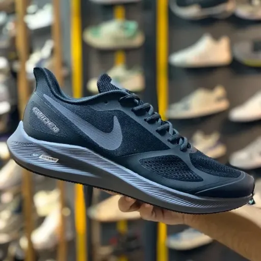 کتونی نایکی ایر زوم گاید سایز بزرگ (Nike Air Zoom Structure / Guide) - رویه پارچه‌ای مشکی با زیره لژدار طبی و سووش طوسی زغالی | مستر کوالیتی
